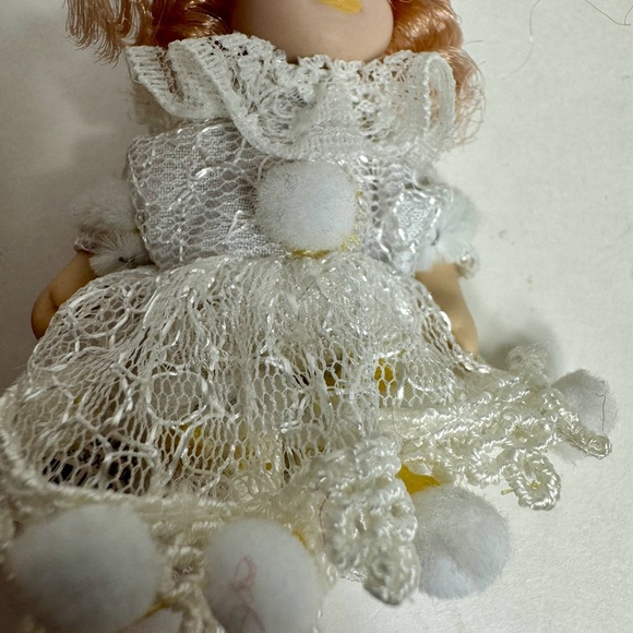 NWT. 7 porcelain doll ornaments. 5 of little girl and 2 of baby. - Picture 8 of 14